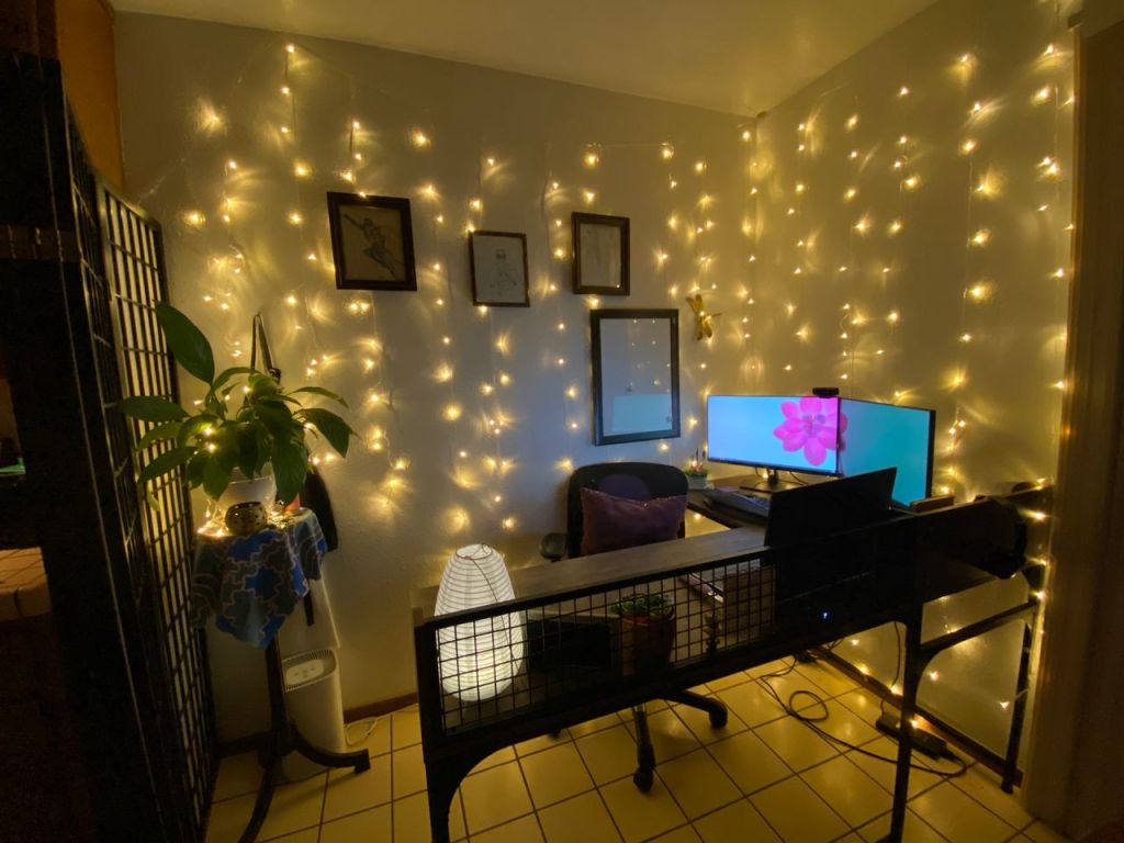 a series of images showing a small office in the corner of a kitchen with fairy lights